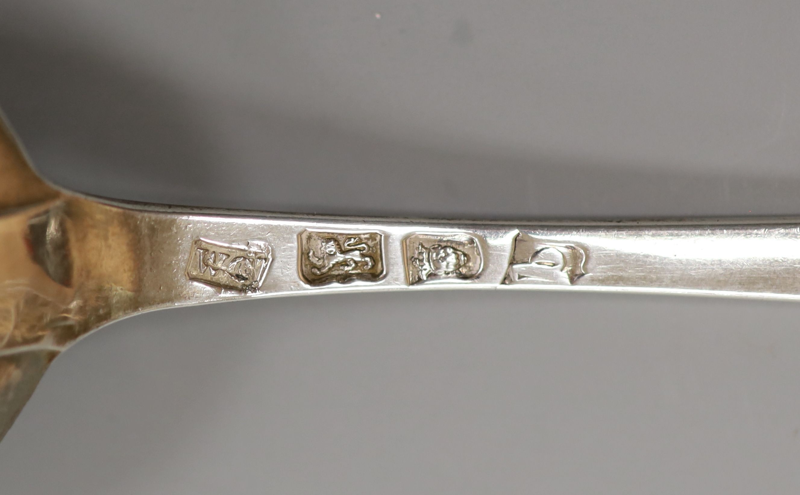 A cased pair of silver clothes brushes, silver quaich-type trophy and a George III silver dessert spoon.